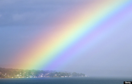 Rainbow over township of Nords Wharf, Lake Macquarie, New South Wales, Australia